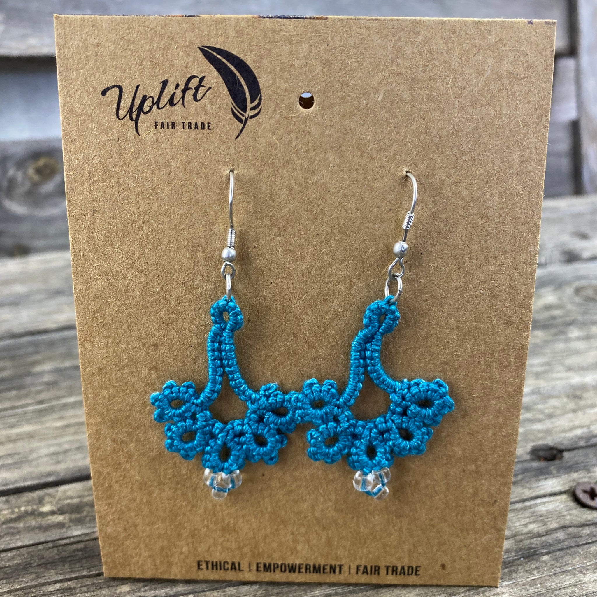 Turquoise fan-shaped tatted earrings with 3 small beads.