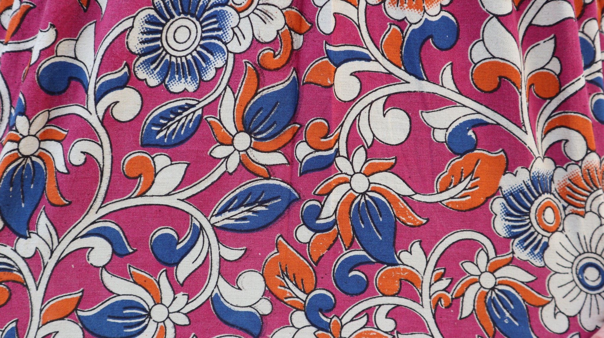 Fair trade ethical bell sleeve top with square neck, an orchid purple patterned design with traditional Indian Tanjore Art - vines with various flowers of blue and orange colours are displayed