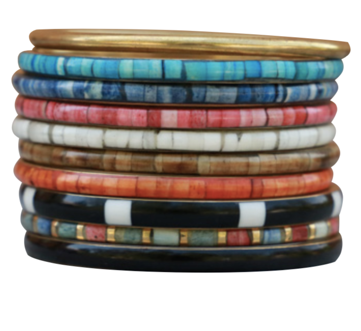 stack of our metal and resin bangles in different colours. in order from top to bottom, gold, aqua, blue, pink, white, brown, orange, black and white, multi-coloured, black