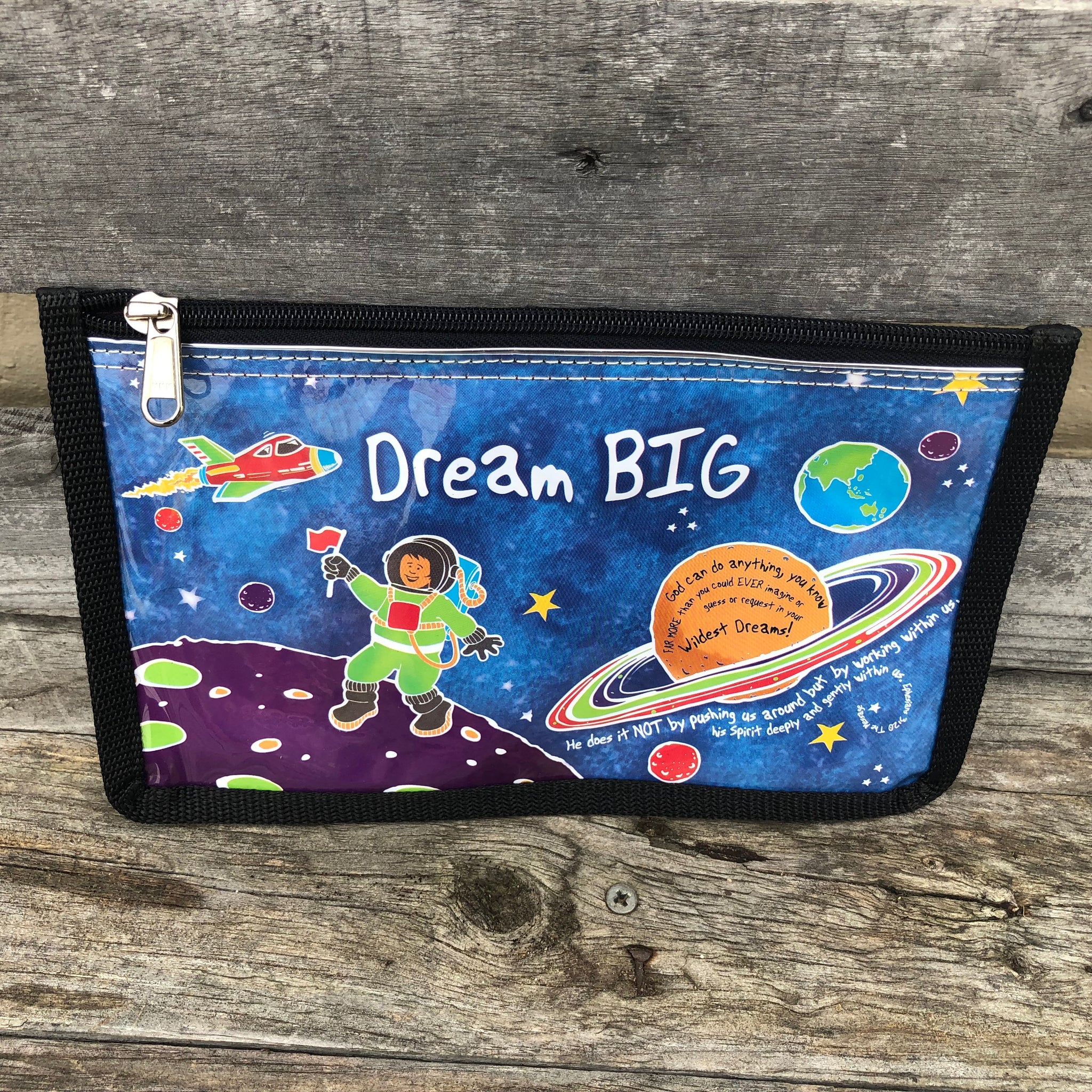 Blue vinyl rectangular pencil case with the words 'Dream Big' and a picture of space with an astronaut.