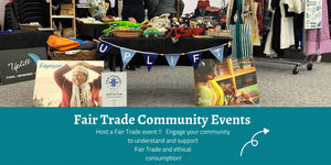 An Uplift Fair Trade stall set up at Erina Baptist Church. Tables with products made by artisans and clothing racks. signs with pictures of the people who make the products.