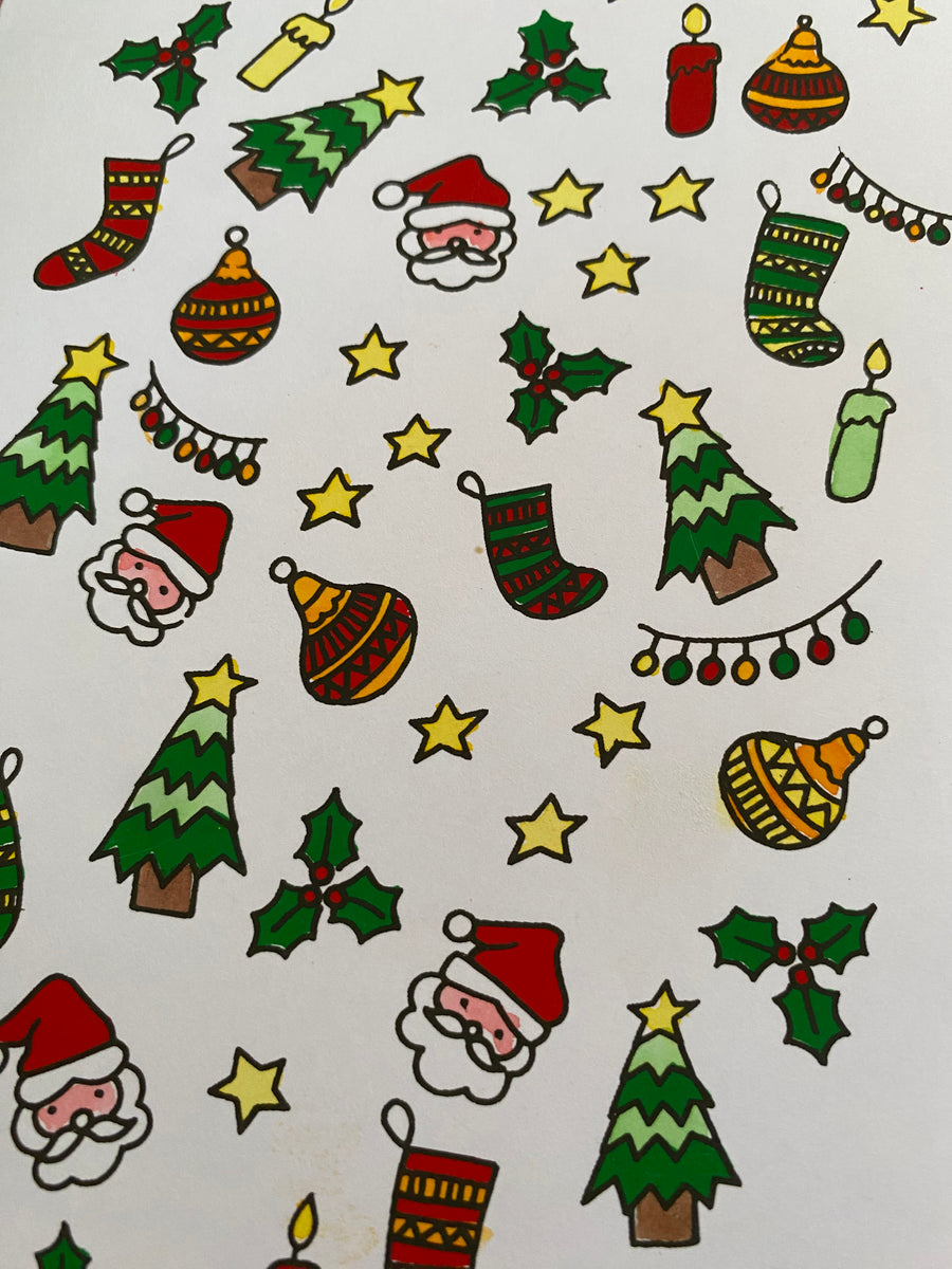 Christmas-themed icons on a christmas card textured surface