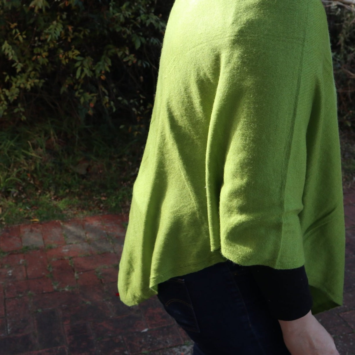 A fresh green colour poncho in V neck design