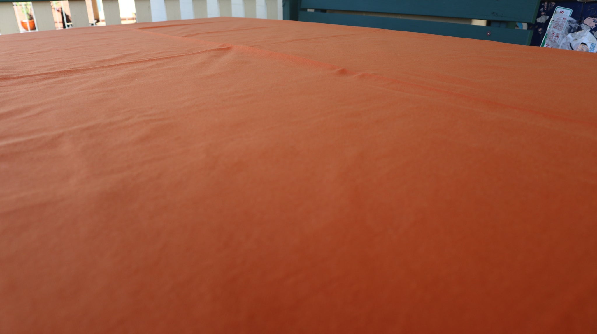 Fair trade ethical handwoven table cloth in a tiger orange colouring