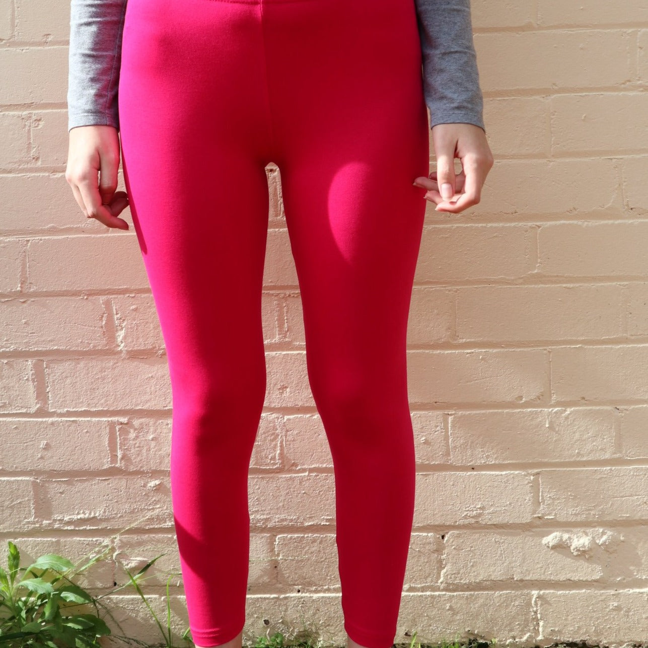 Organic Cotton leggings in a reddy pink colour